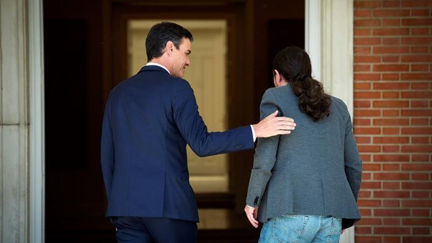 Sánchez e Iglesias rebajan la tensión para sellar un pacto