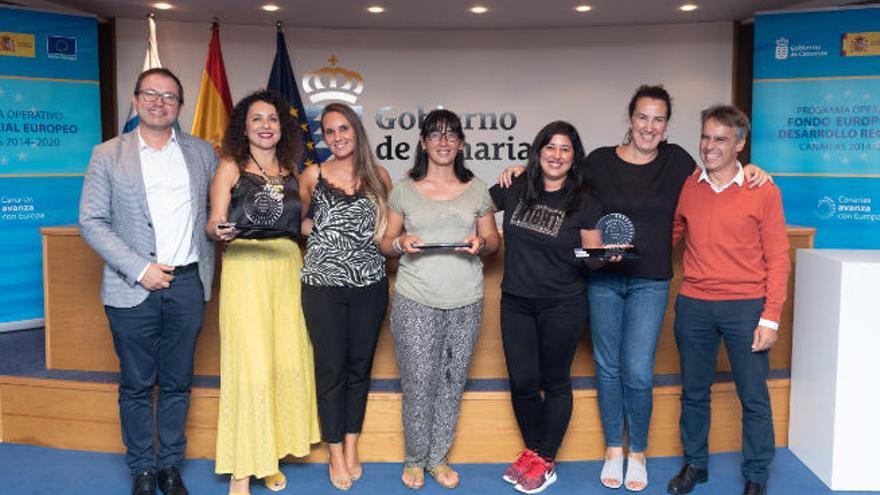 Imagen de los tres premiados.