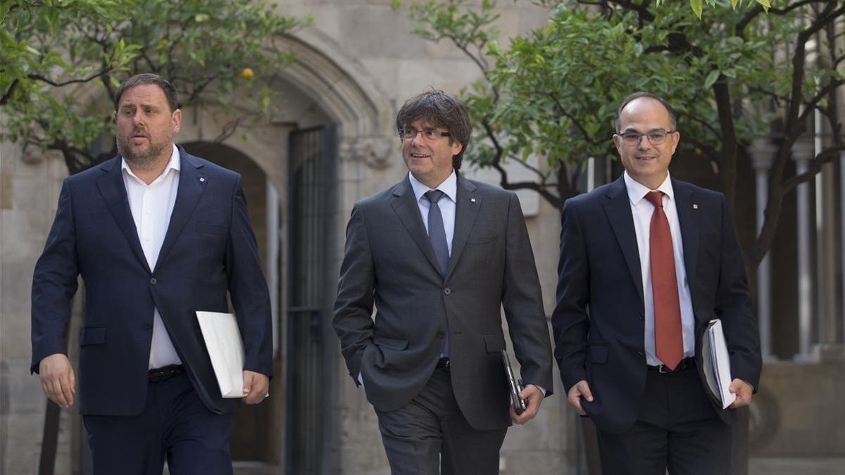 Oriol Junqueras, Carles Puigdemont y Jordi Turull