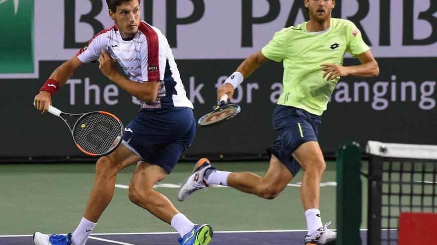 Pablo Carreño y João Sousa, en el partido de dobles que perdieron frente a Nadal y Tomic en Indian Wells.