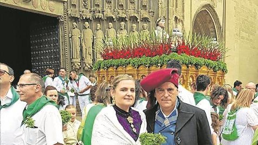 Vítores y aplausos acompañan a San Lorenzo por la ciudad