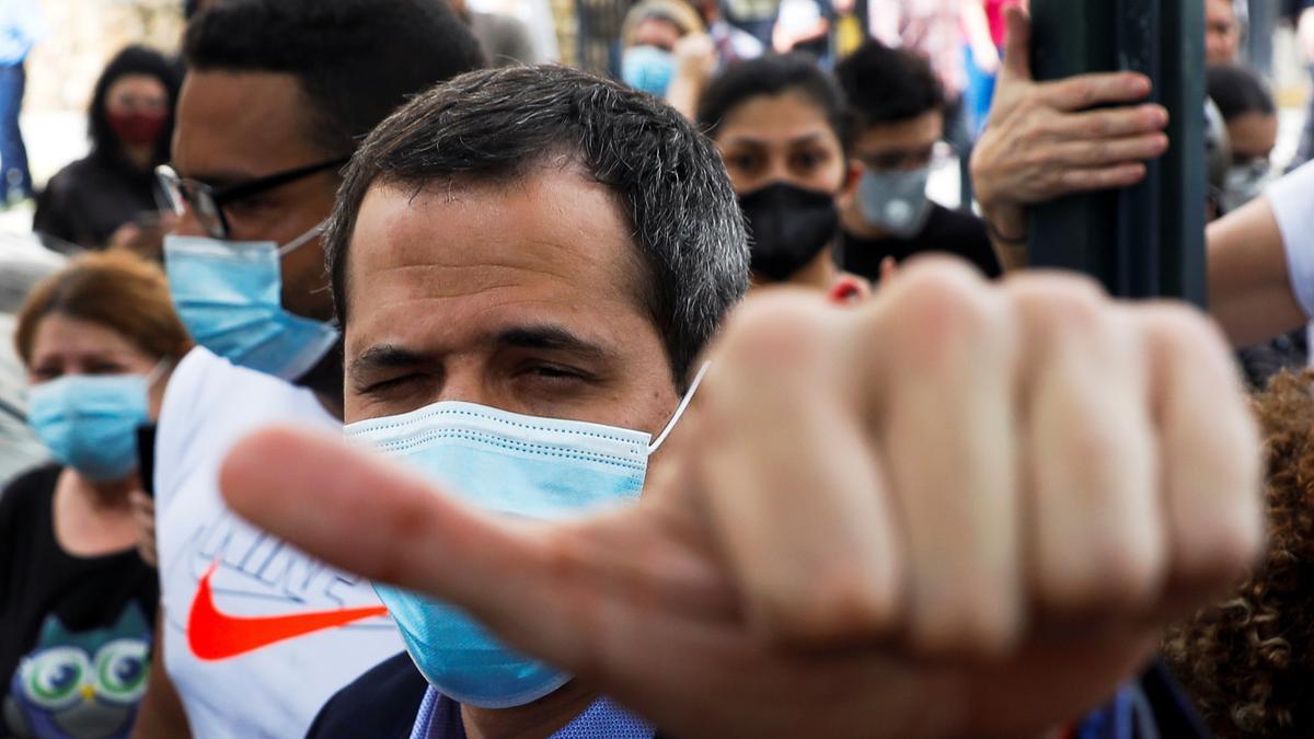 Venezuela's opposition leader Juan Guaido gestures, in Caracas