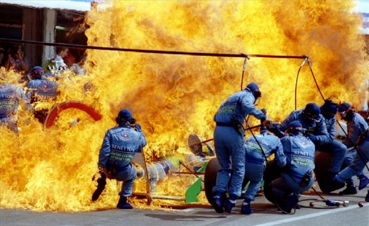 Petrol sprays on the Formula One racing car of Netherland’s Jas Verstappen seconds before the car and the crew of Benetton Ford caught on fire during refueling at the German F-1 Grand Prix in Hockenheim in this July 31, 1994 file photo.