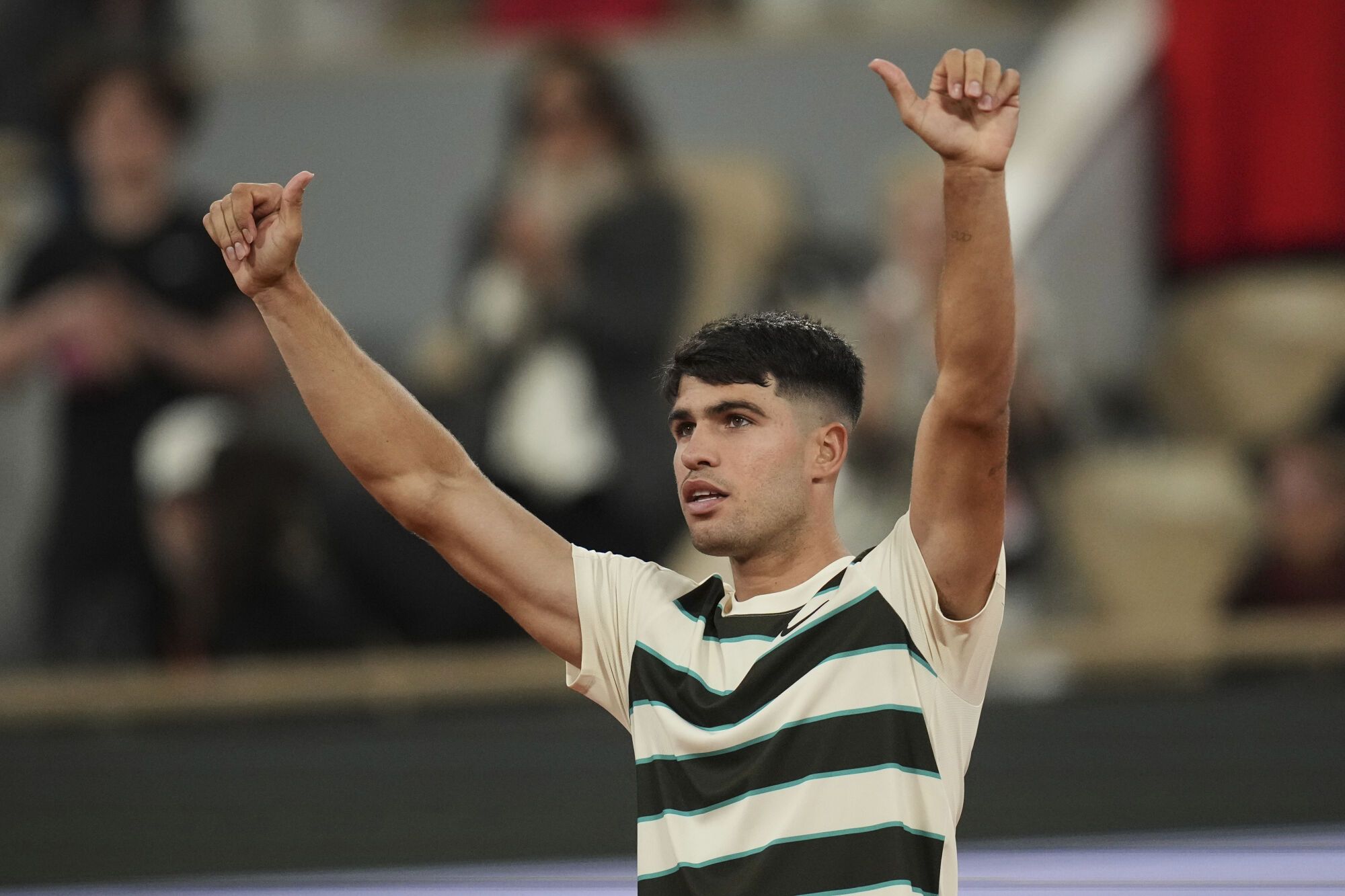 Spain's Carlos Alcaraz celebrates beating Hungary's Fabian Maroszan after their second round match of the French Tennis Open, at the Roland-Garros stadium, in Paris, Wednesday, May 28, 2025. (AP Photo/Christophe Ena). EDITORIAL USE ONLY / ONLY ITALY AND SPAIN