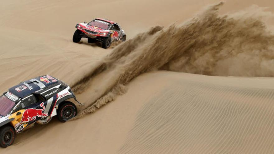 Dos coches en una edición del Dakar