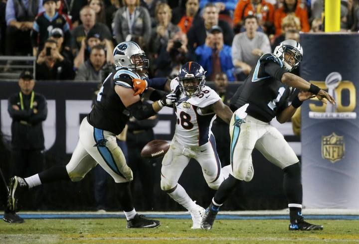 Denver Broncos' Von Miller strips the ball away from Carolina Panthers' quarterback Cam Newton during the fourth quarter of the NFL's Super Bowl 50 football game in Santa Clara