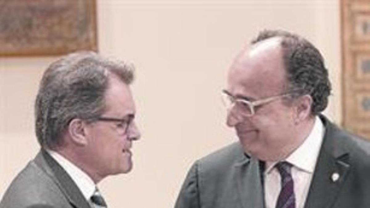 El Síndic de Comptes, Jaume Amat, junto al 'president' Artur Mas.