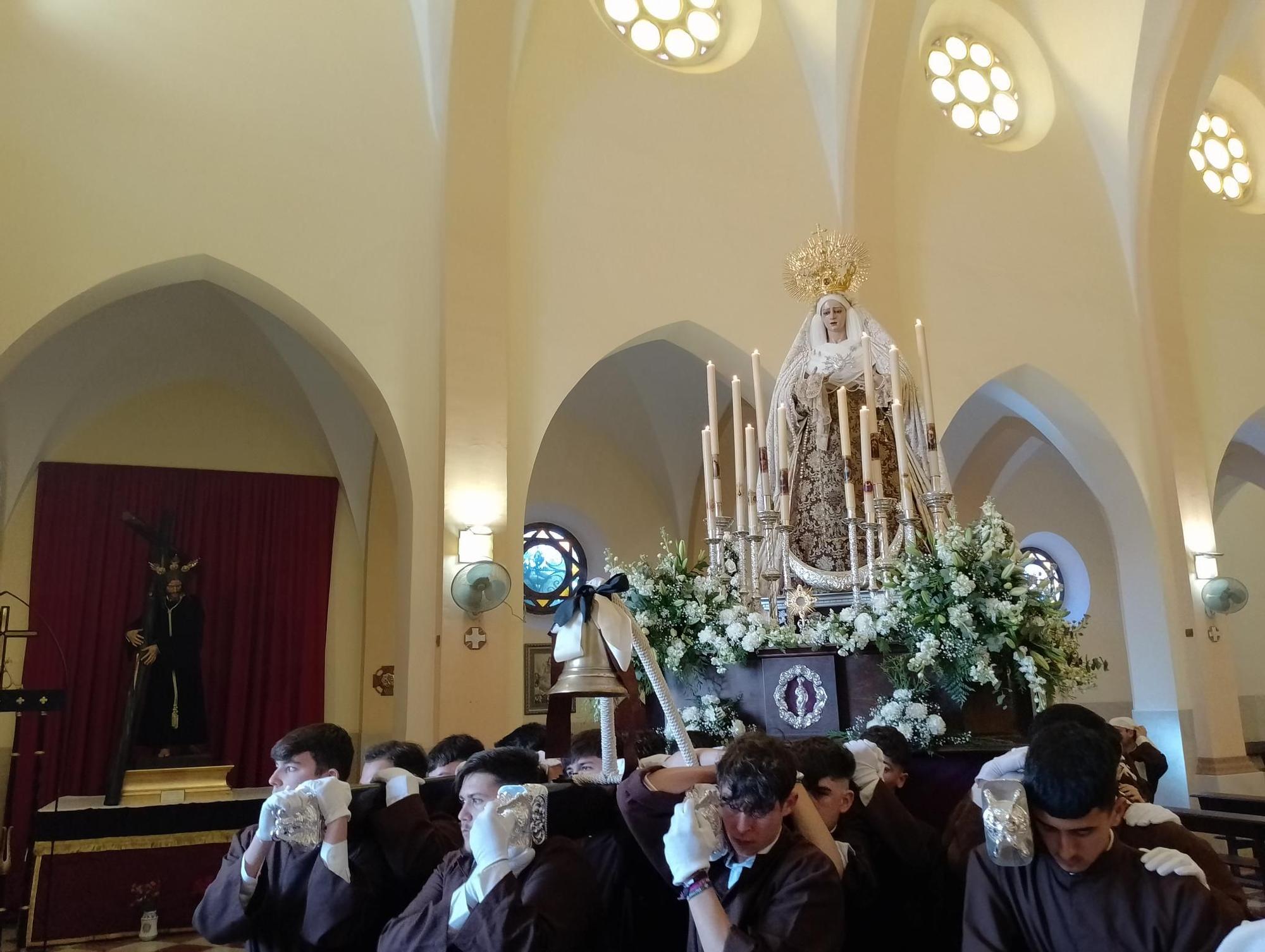 La procesión de la Virgen de Lágrimas del Carmen de Huelin, en imágenes