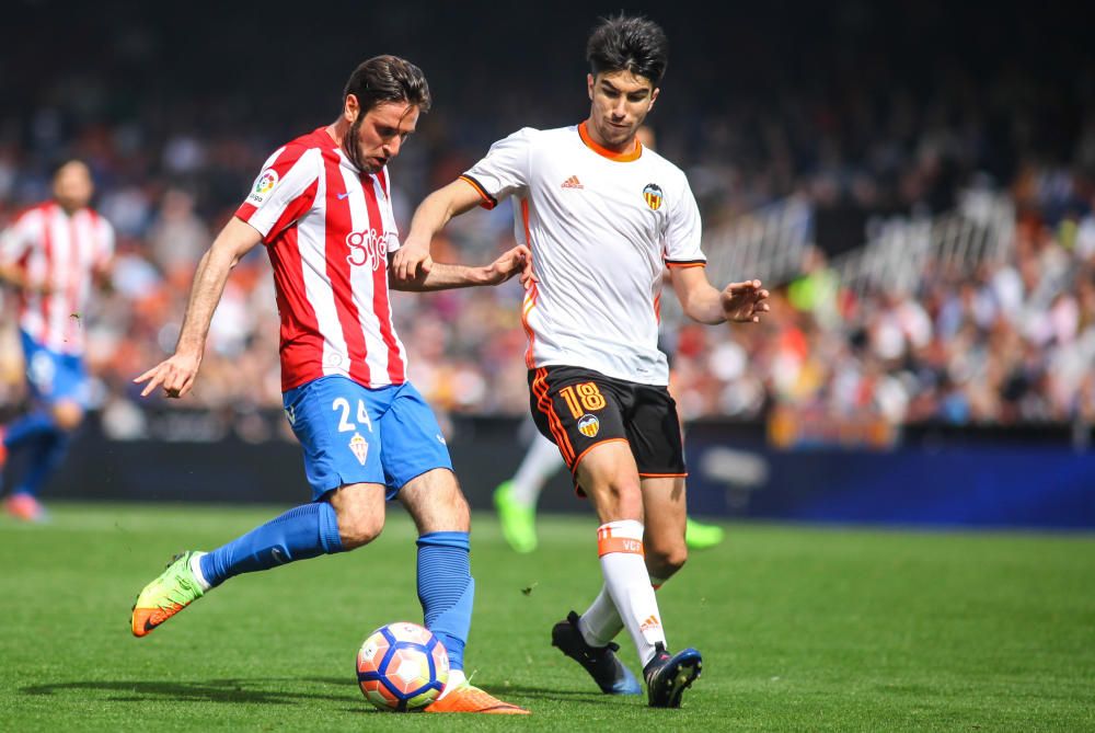 El partido entre el Valencia y el Sporting, en imágenes