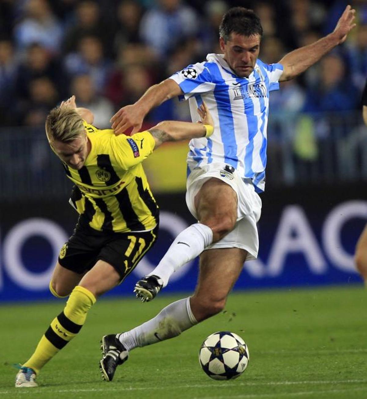 Toulalan disputa una bola ante Reus.