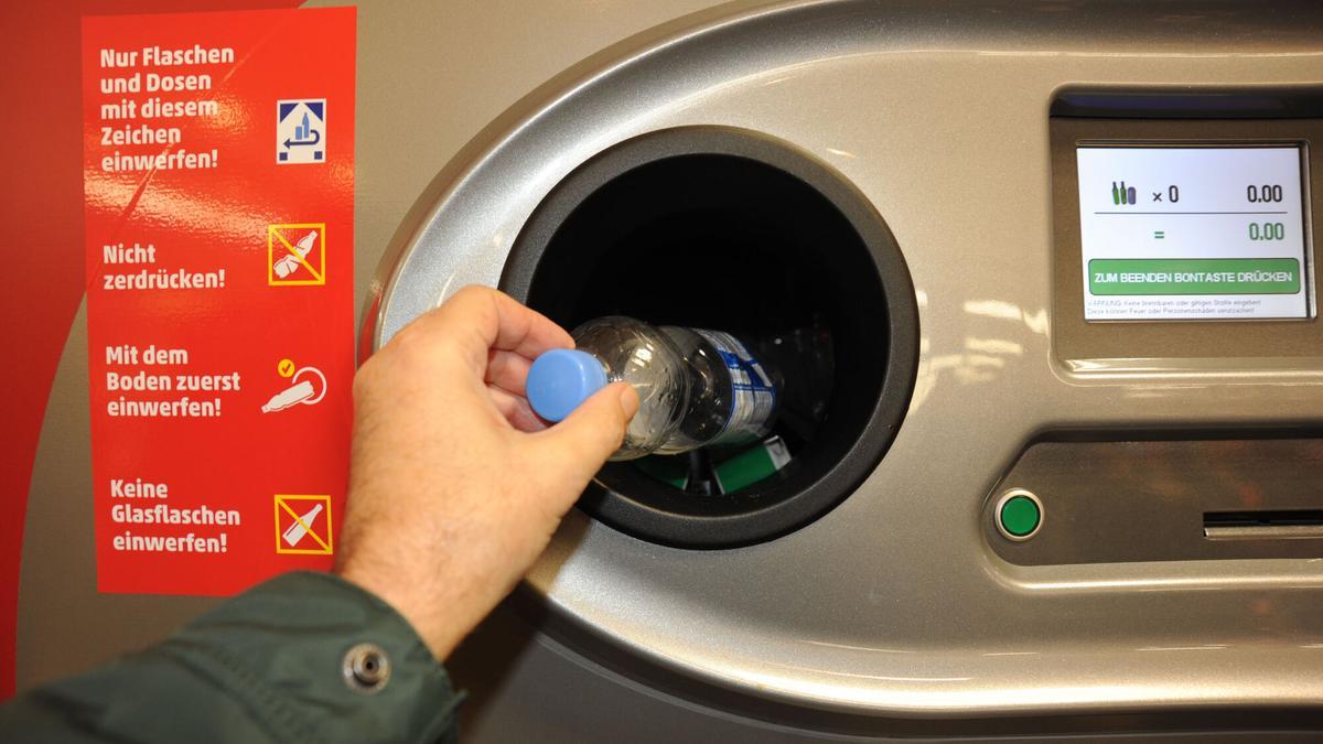 Máquina de depósito de envases plásticos