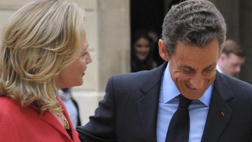 Hillary Clinton y Nicolas Sarkozy.