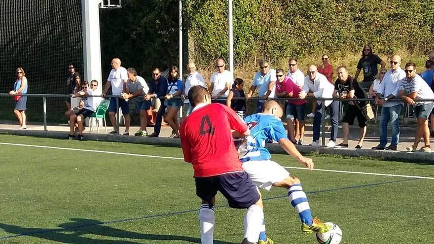 Un momento del partido entre el Avilés Stadium y el Bosco.