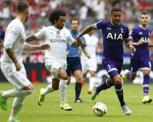 Tottenham Hotspur's Walker fights for the ball with Real Madrid's Marcelo during their pre-season Audi Cup tournament soccer match in Munich