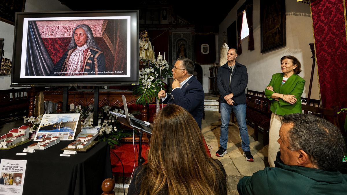 Un momento de la presentación, donde pueden verse las maquetas y un retrato hecho con IA sobre Amara Pargo.