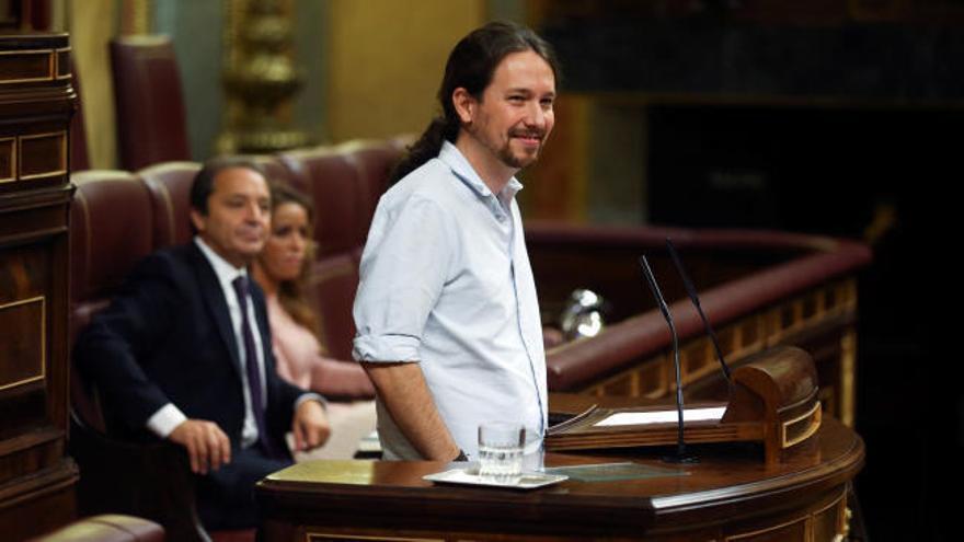 Iglesias, a Rajoy: "Con los SMS se maneja usted de maravilla"