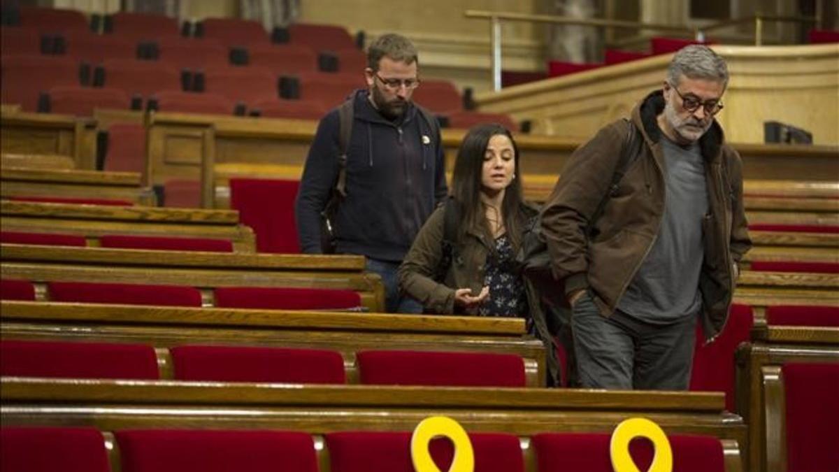 Tres de los diputados de la CUP, en el Parlament, el pasado octubre.