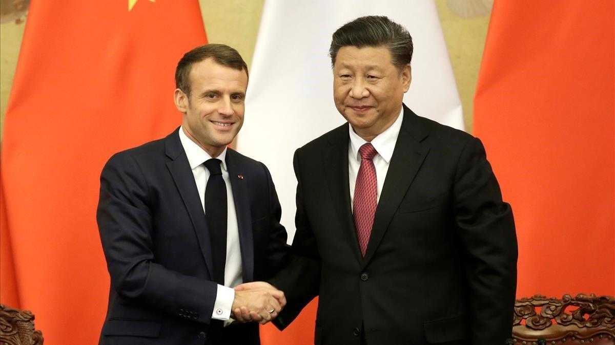 zentauroepp50766576 french president emmanuel macron shakes hands with china s p191106090249