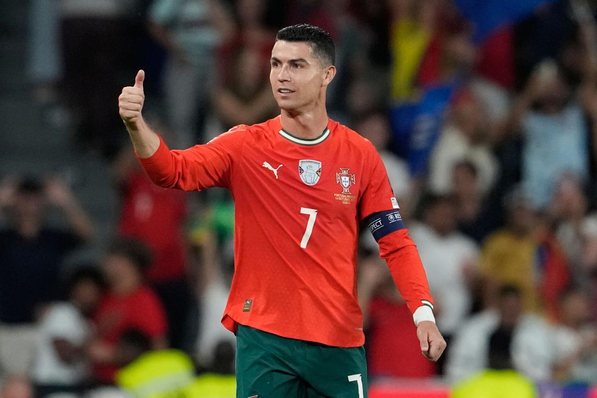 Portugal's Cristiano Ronaldo celebrates after scoring during a World Cup 2026 group F qualifying soccer match between Portugal and Hungary in Lisbon, Tuesday, Oct. 14, 2025. (AP Photo/Armando Franca)