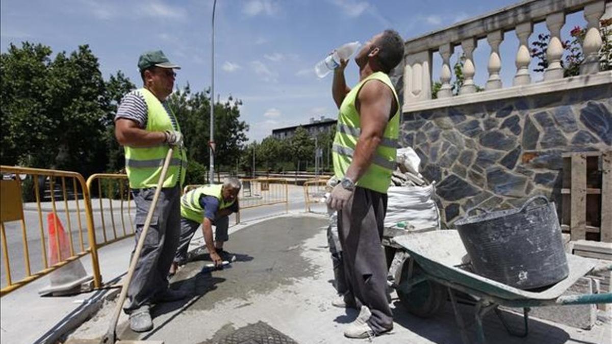 Trabajadores de la construcción, en una obra en Barcelona.