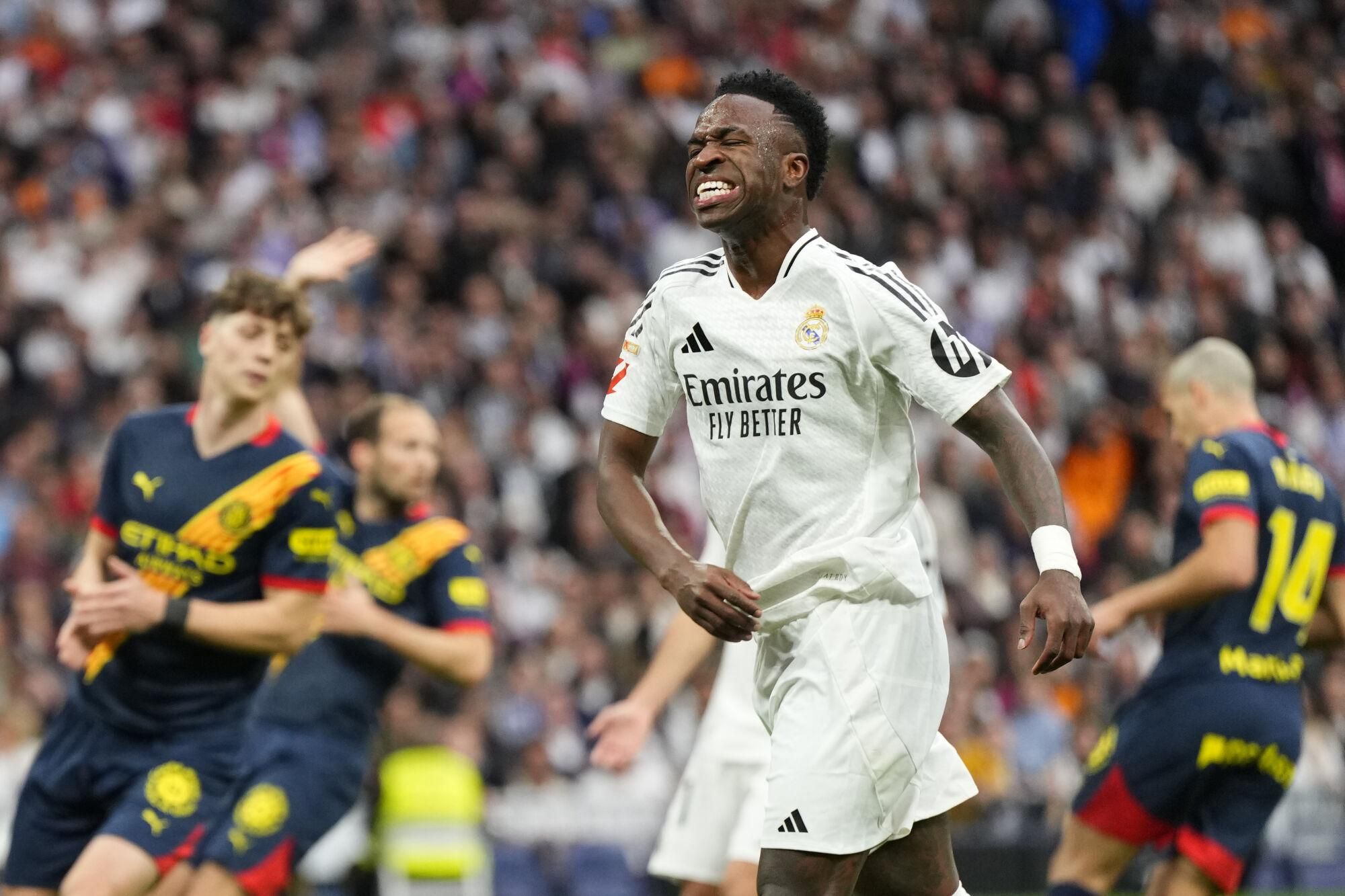 Real Madrid's Vinicius Junior reacts during the Spanish La Liga soccer match between Real Madrid and Girona at the Santiago Bernabeu stadium in Madrid, Spain, Sunday, Feb. 23, 2025. (AP Photo/Manu Fernandez). EDITORIAL USE ONLY/ONLY ITALY AND SPAIN
