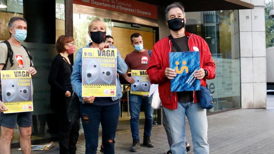 Marta Minguella, delegada de CGT Ensenyament, i Xavier Massó, secretari general de Professors de Secundària