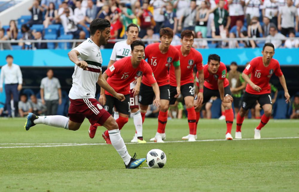 Les imatges del Corea del Sud-Mèxic (1-2)