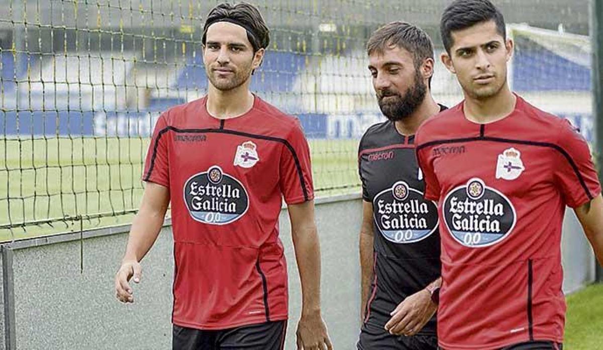 Somma, junto a Fran Molano y Bicho, ayer en Abegondo.