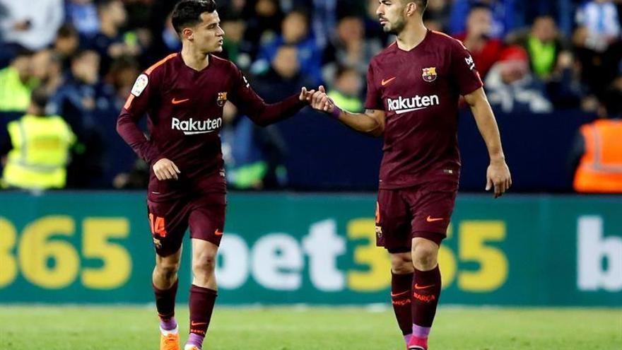 Suárez y Coutinho firman un triunfo del Barcelona que hunde más al Málaga (0-2)