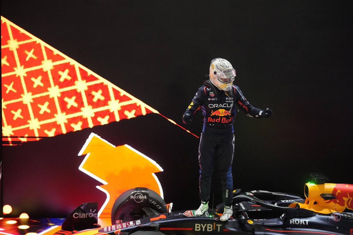 Red Bull driver Max Verstappen of the Netherlands celebrates after winng the Qatar Formula One Grand Prix at the Lusail International Circuit in Lusail, Qatar, Sunday, Dec. 1, 2024. (AP Photo/Darko Bandic)