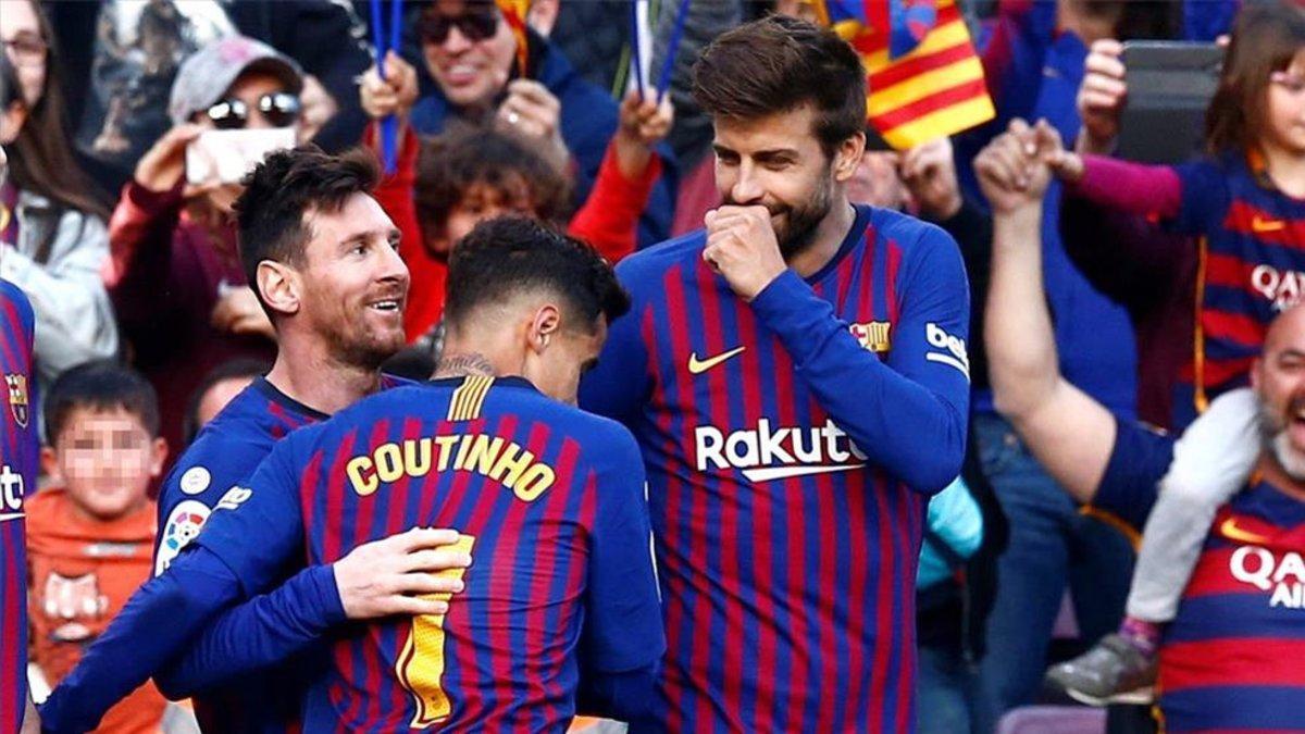Leo Messi, con Piqué y Coutinho