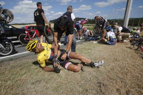 Race leader and yellow jersey holder Trek Factory rider Fabian Cancellara of Switzerland lies on the ground after a fall during the third stage of the 102nd Tour de France cycling race from Anvers to Huy