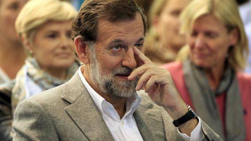 Rajoy garantiza que el PP superará la crisis por su &quot;coraje&quot; y &quot;patriotismo&quot;