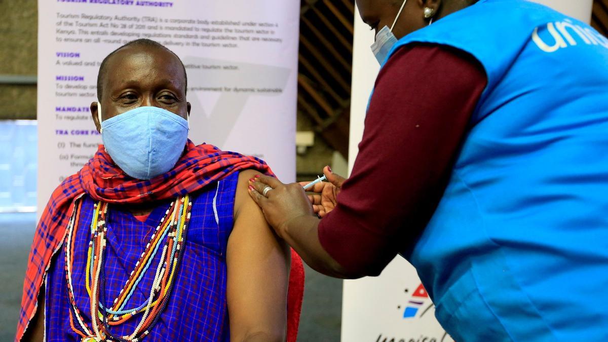 FILE PHOTO: Kenyan tour guide Daniel Ole Kissipan receives the AstraZeneca/Oxford vaccine under the COVAX scheme in Nairobi FILE PHOTO: Kenyan tour guide Daniel Ole Kissipan receives the AstraZeneca/Oxford vaccine under the COVAX scheme in Nairobi