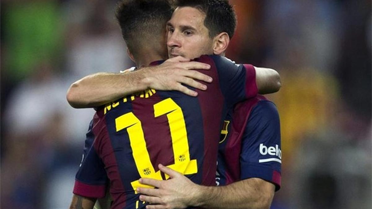 Messi y Neymar, celebrando uno de los seis goles al Granada