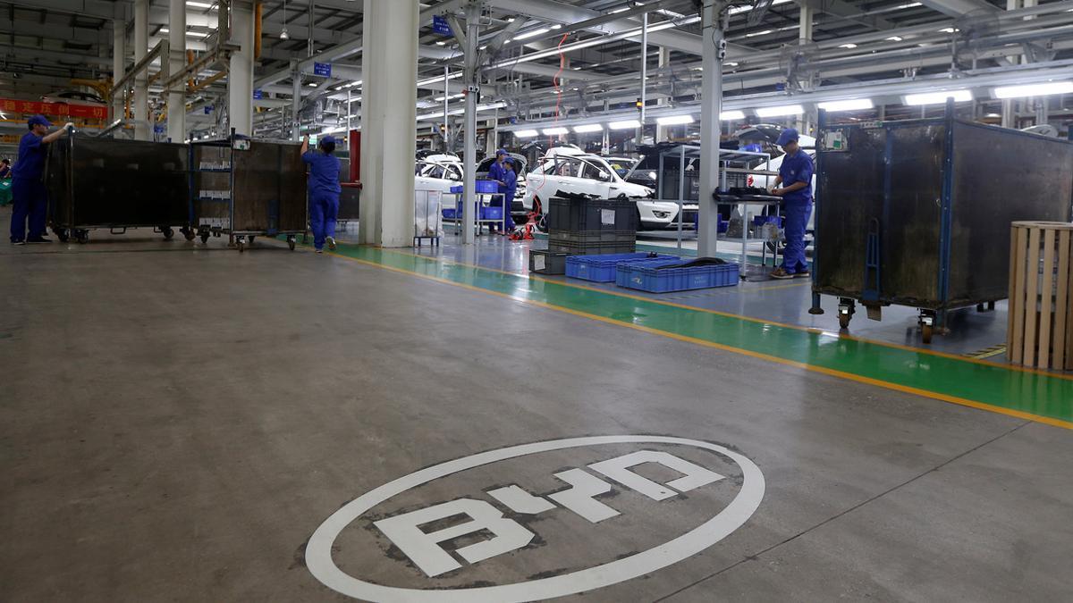 FILE PHOTO: A logo of BYD is painted inside an assembly line of the automobile maker in Shenzhen