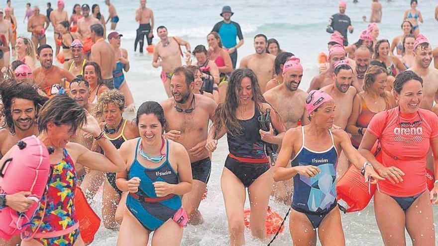 Caras de felicidad entre los participantes de la travesía solidaria.