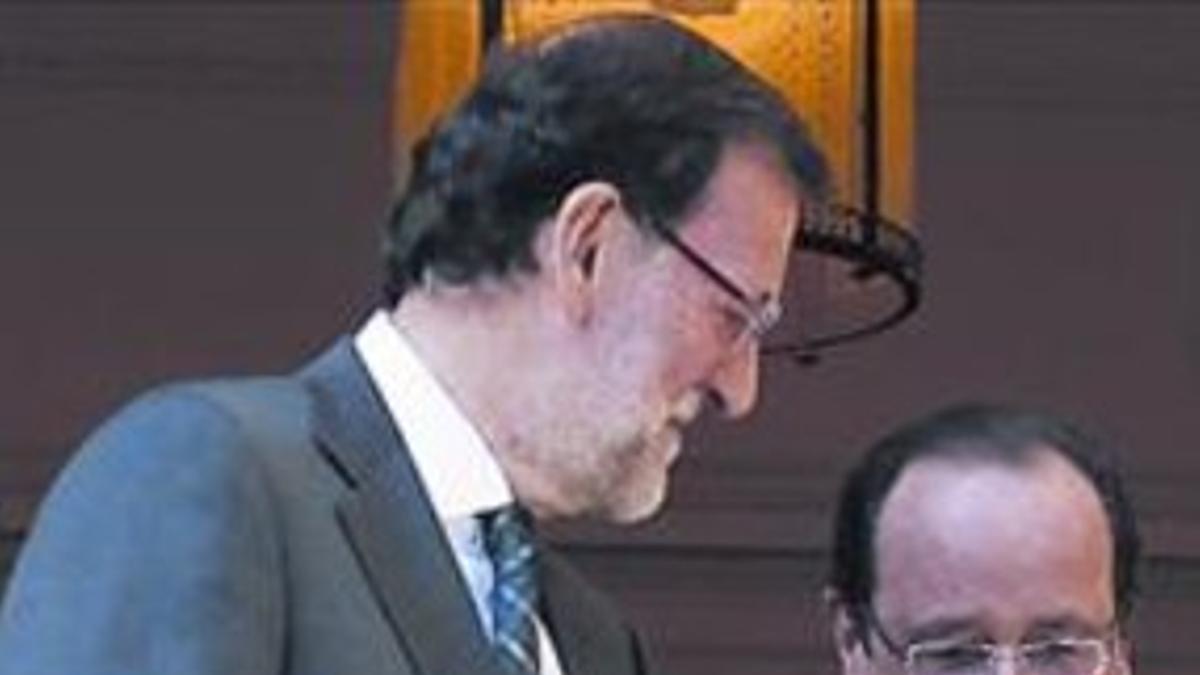 Rajoy y Hollande, ayer en la Moncloa.