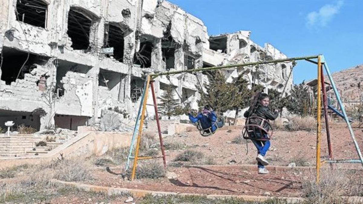 Niños jugando en Malula (Siria), ayer.