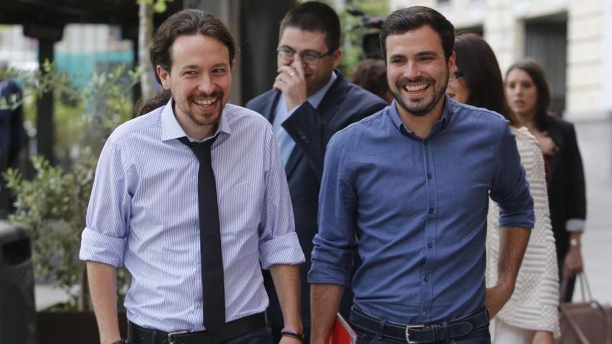 Pablo Inglesias y Alberto Garzón llega al Hotel Ritz de Madrid a un desayuno informativo.