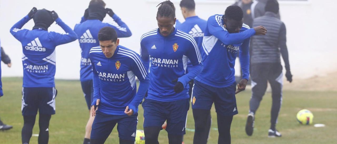 Fran Gámez, Jair y Gueye, en el entrenamiento de este lunes.