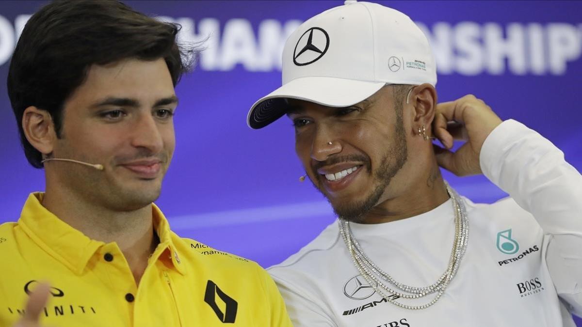 Carlos Sainz, entonces en Renault, junto a Lewis Hamilton.