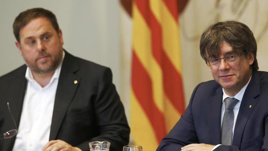 Oriol Junqueras y Carles Puigdemont.