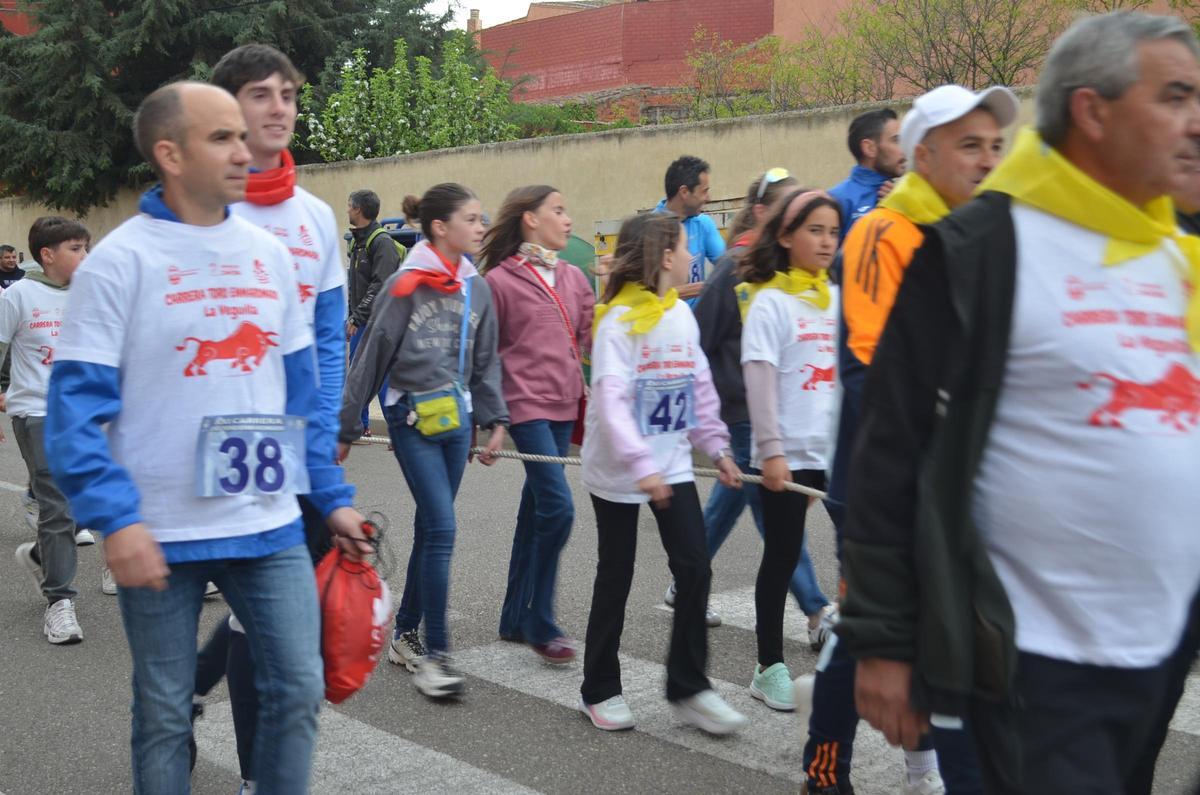 La XXI Carrera del Toro Enmaromado en La Veguilla, en imágenes