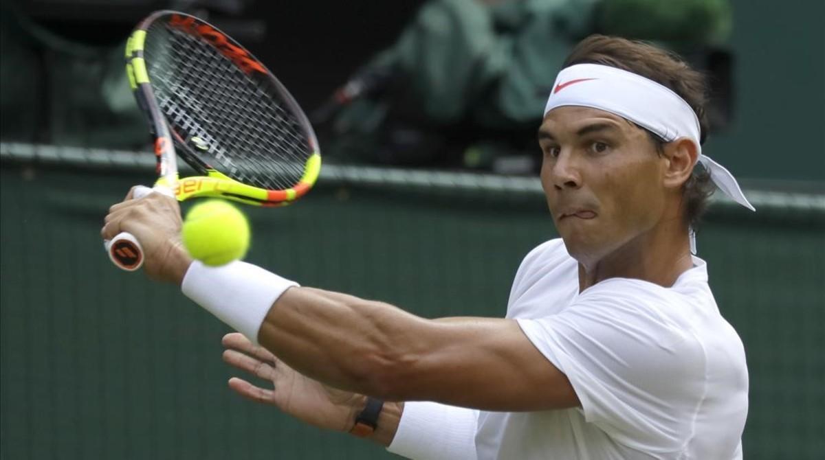 jpujol44193209 rafael nadal of spain returns the ball to australia s alex d180707152335