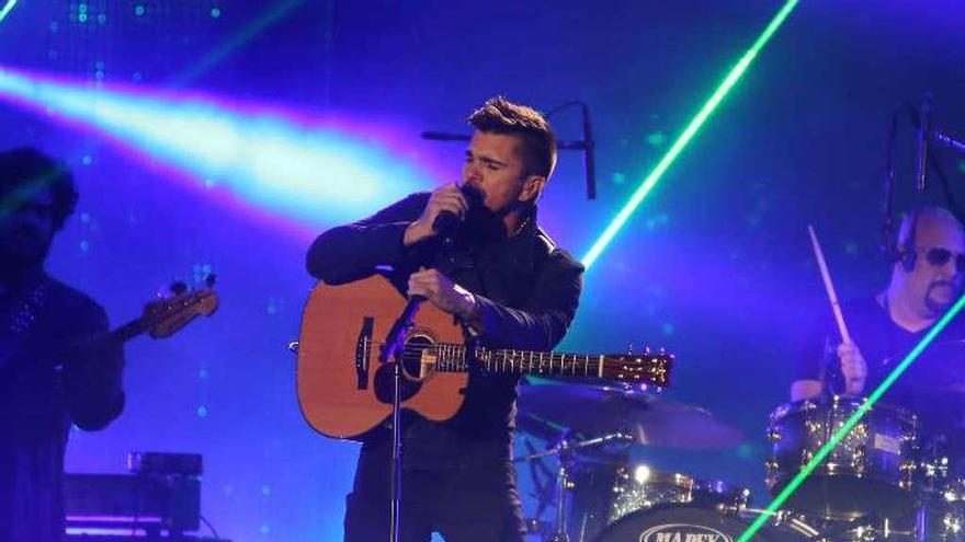 El cantante Juanes, durante un concierto. // Efe