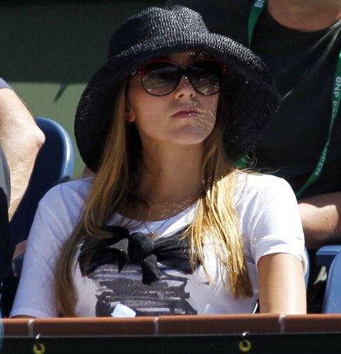 Ristic, girlfriend of Djokovic of Serbia, watches him play against Andujar of Spain during their match at the Indian Wells ATP tennis tournament in Indian Wells