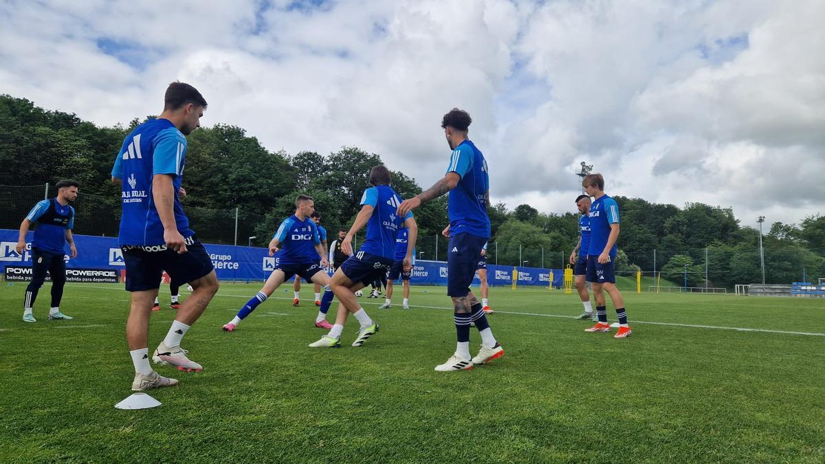 Los jugadores, en el entrenamiento de esta mañana