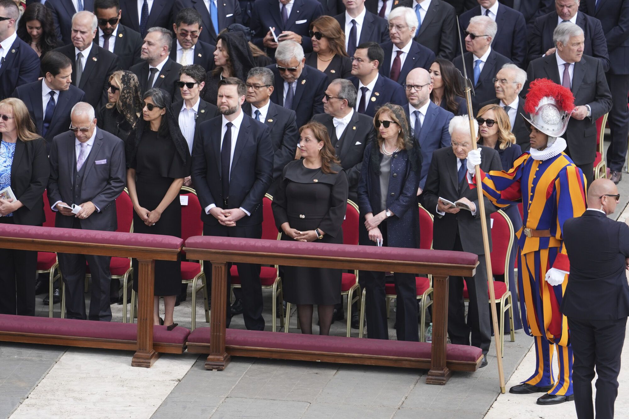 Vice President JD Vance, center, and his wife Usha, center left, attend the inaugural Mass of Pope Leo XIV's pontificate in St. Peter's Square at the Vatican, Sunday, May 18, 2025. (AP Photo/Jacquelyn Martin, Pool) Associated Press/LaPresse. EDITORIAL USE ONLY/ONLY ITALY AND SPAIN