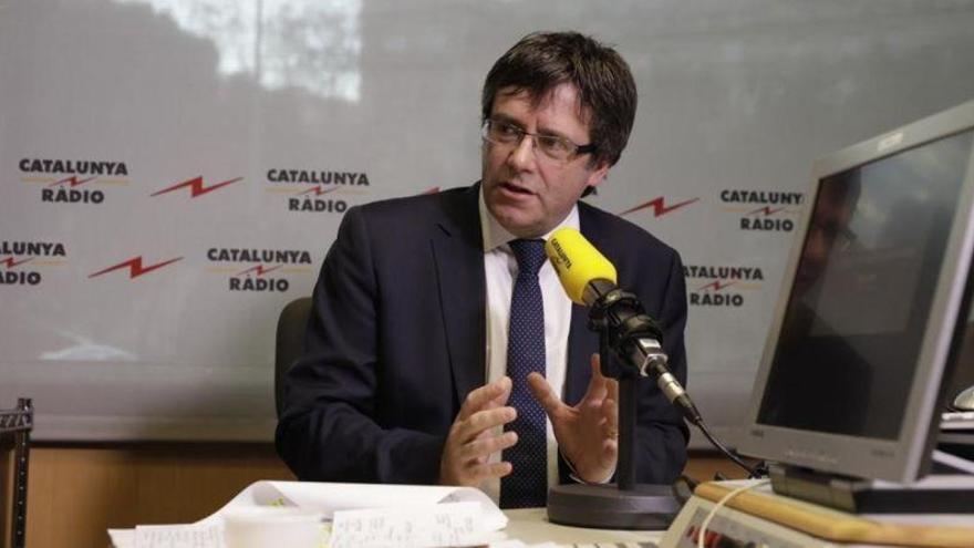 Puigdemont anuncia que se reunirá con Rajoy este mes de enero